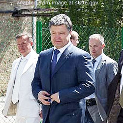 Petro Poroshenko file photo, with additional men in background, adapted from image at state.gov
