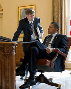File Photo of Michael McFaul Standing and Barack Hussein Obama Sitting at Desk, adapted from image at whitehouse.gov