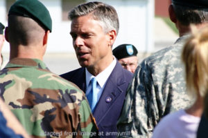 File Photo of John Huntsman, Men in Military Uniforms and Others, adapted from image at army.mil