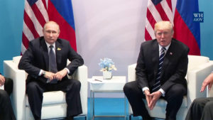 Vladirmir Putin and Donald Trump Sitting in Chairs with Flags Behind, adapted from image at whitehouse.gov