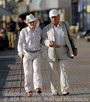 File Photo of Two Elders Walking Outdoors