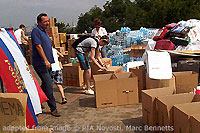 File Photo of Russian Volunteer Effort, With Group of People Outdoors with Boxes