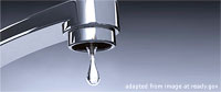File Photo of Water Facet with Drop of Water Coming Out