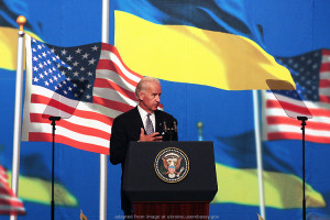 File Photo of Joe Biden at Podium with U.S. Seal, With Ukrainian and U.S. Flags in Background
