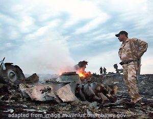 Ukraine Air Crash Scene with Uniformed Security Personnel, Flames, Smoke