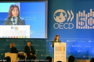 File Photo of Elvira Nabiullina at OECD Event, at Podium and On Large Video Screen