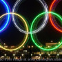 Olympic Rings Lit at Night, adapted from image at state.gov