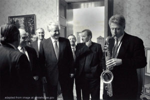 File Photo of Boris Yeltsin, Bill Clinton Playing a Saxophone, Lloyd Bentsen and others, adapted from image at whitehouse.gov