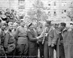 American Solider Meets Russian Soliders in Berlin in 1945, adapted from image at army.mil