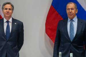 Blinken and Lavrov Posing Before U.S. and Russian Flags, adapted from image at ru.usembassy.gov