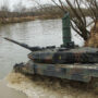 File Photo of Leopard Tank Preparing to Ford a River, adapted from Defense.gov image with photo credit to Army Sgt. Garrett Ty Whitfield