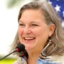 File Photo of Victoria Nuland and U.S. Flag, adapted from image featured at usembassy.gov