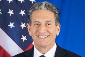 File Photo of James Rubin and American Flag, adapted from state.gov image