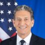 File Photo of James Rubin and American Flag, adapted from state.gov image